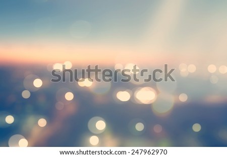 Blurred cityscape background scene at dawn from above