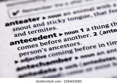 Blurred close up to the partial dictionary definition of Antecedent
