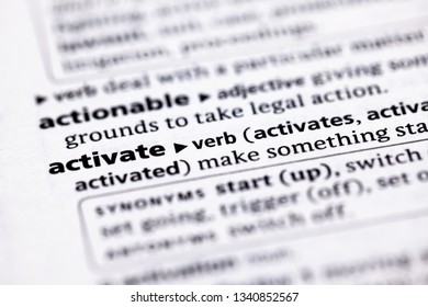 Blurred close up to the partial dictionary definition of Activate