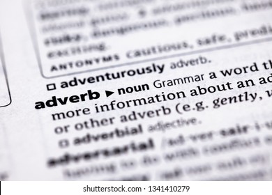 Blurred Close Up To The Partial Dictionary Definition Of Adverb