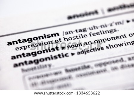 Blurred close up to the partial dictionary definition of Antagonism