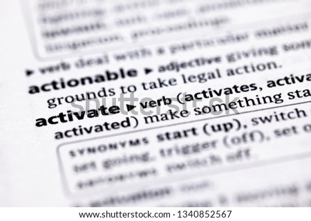 Blurred close up to the partial dictionary definition of Activate