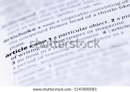Blurred close up to the partial dictionary definition of Article