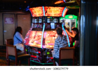 Blurred Coin Pusher Game At Cruise Ship