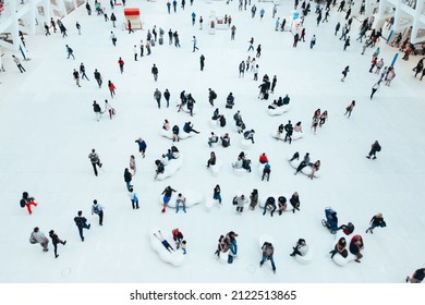 Blurred Concept With A Mass Of People Doing Things. View From Above