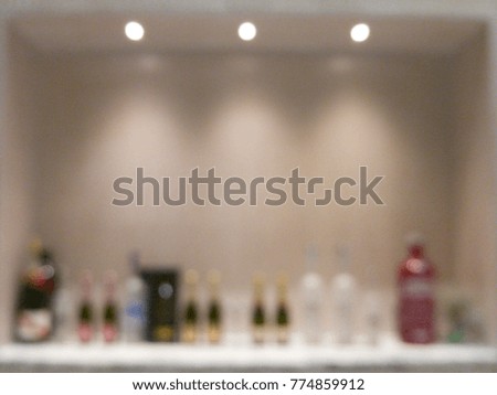 Blurred counter bar with alcohol beverage such as vodka, champagne, beer and rum in the hotel. And for those who enjoy drinking hobby