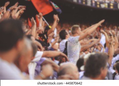 Blurred Crowd Of Spectators On Stadium At A Sporting Event