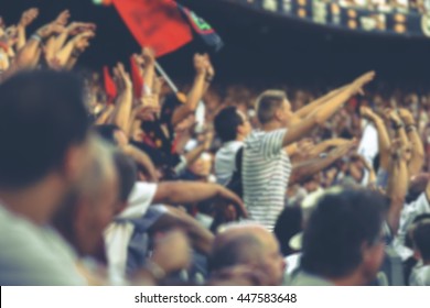 Blurred Crowd Of Spectators On Stadium At A Sporting Event