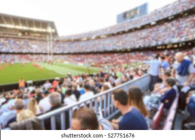 Blurred Crowd Of Spectators On Stadium At A Sporting Event