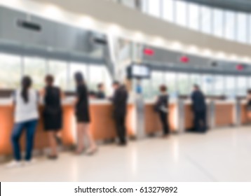 Blurred Customer Transaction In Bank Counter Background