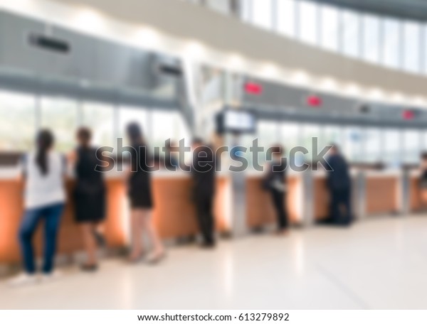 Blurred\
customer transaction in bank counter\
background