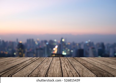 Blurred Dark Night City Background With Wood Panels Perspective For Show Promote Product Concept.