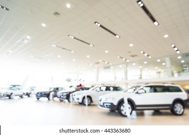 Blurred dealership store, with the cars and soft lightning