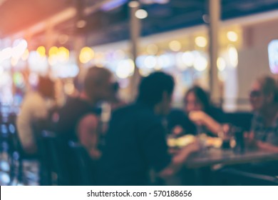 Blurred or Defocus image of restaurant or Cafeteria for use as Background with vintage tone.