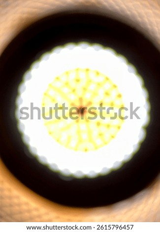 Blurred defocused effect on round led light lamp object isolated on vertical ratio background.