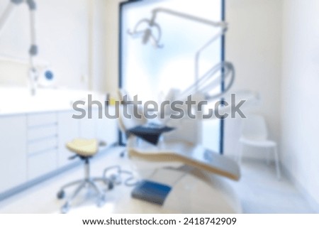 Blurred dental clinic background. Defocused interior of modern dental office. Beautiful dental cabine