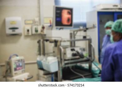 Blurred Of Doctor Insert Bronchoscope To Patient