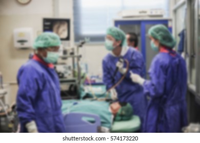 Blurred Of Doctor Insert Bronchoscope To Patient