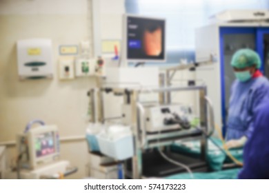 Blurred Of Doctor Insert Bronchoscope To Patient