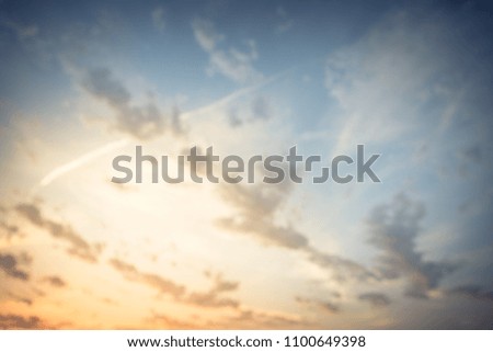 Blurred dramatic sunrise cloud formation across the sky in countryside of Texas, USA. Blurry cyan gradient of peaceful nature. Abstract natural landscape background