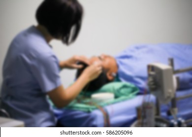 Blurred Of EEG Electrode Placement To Patient