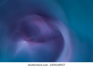 blurred electrical pink, maroon, violet, purple, silver and blue waves on dark sky background - Powered by Shutterstock