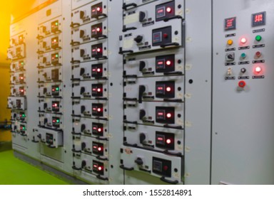 Blurred Of Electrical Switch Gear At Low Voltage Motor Control Center Cabinet  In Coal Power Plant. Blurred For Background.