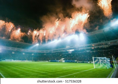 Blurred Empty Night Grand Soccer Arena In The Lights. Abstract Sports Background With Bokeh.