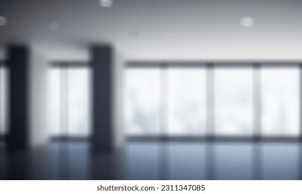 Blurred empty open space office. Abstract light bokeh at office interior background for design and table - Shutterstock ID 2311347085