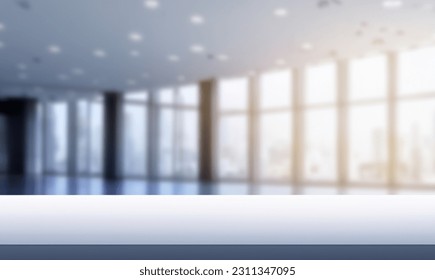 Blurred empty open space office. Abstract light bokeh at office interior background for design and table - Shutterstock ID 2311347095