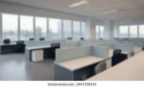 Blurred empty open space office.
Abstract light bokeh at office interior background