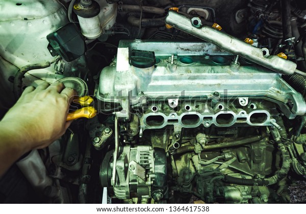 Blurred engine car\
damage in car cash service\

