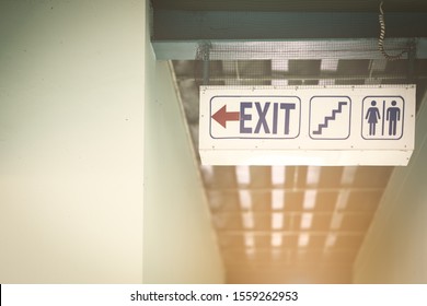 Blurred exit staircase and toilet sign symbol in building - Shutterstock ID 1559262953