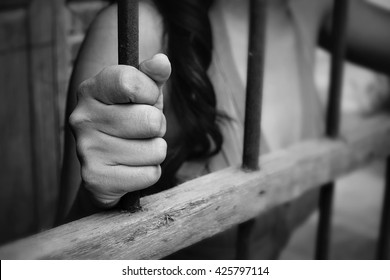 Image result for image of a woman running away from prison or cage