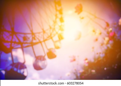 blurred ferris wheel - Powered by Shutterstock