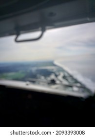 Blurred Of Flight Deck View During Approach Near Coast Line