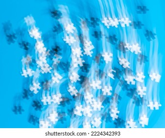 Blurred Fuzzy Black And White Jigsaw Pieces On Blue Background