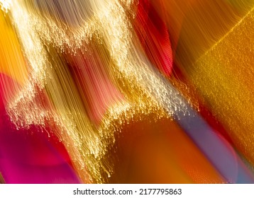 Blurred Fuzzy Golden Star And Magic Wand On Luxurious Red Regal Background