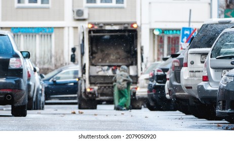 Blurred Garbage Truck, Dustcart With Bin Lift, Household Waste Removal In Residential Area In Winter, Moscow, 22 Nov 2021