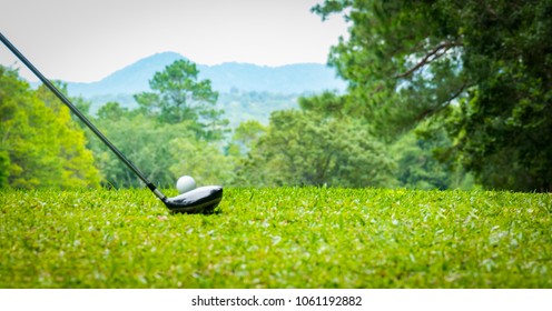 Blurred Golfer Hitting Golf Ball On Tee Off Zone To Hole In One In Tournament In Beautiful Golf Course 