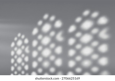 Blurred gray background with subtle shadow patterns of Islamic windows, empty studio space. Textured walls.