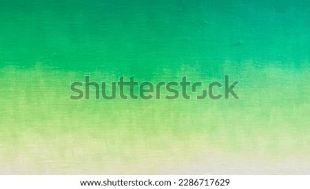 Blurred green paint background on white canvas