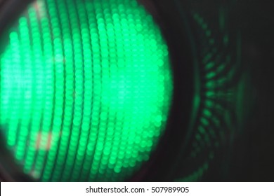 Blurred Green Traffic Light Close Up.