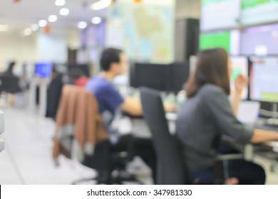 blurred group of employee working as call centre in operation room background concept.
