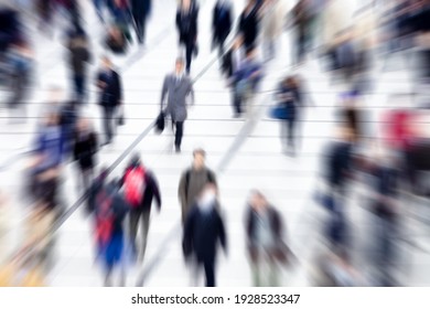 Blurred Group Of People Walking During Rush Hour