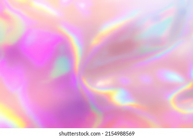 Blurred Holography Abstract Background In Blue Pink Colors. Holographic Color Wrinkled Pearlescent Foil. Holographic Iridescent Rainbow Fabric Abstract Background.