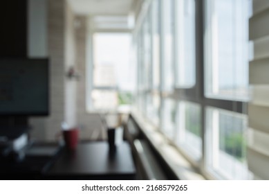 Blurred Of Home Office. Window View, Out Of Focus Background. Abstract Beautiful Backdrop For Text Or Advertising. Unfocused Room, Computer And Table