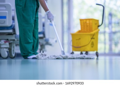 Blurred hospital images, Clean and sanitize, Cleaner, Hospital cleaning,Cleaning the hospital floor. Floor care and cleaning services with washing mop in sterile factory or clean hospital.