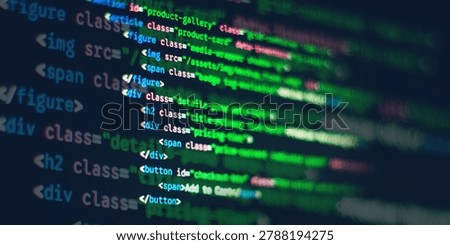 Blurred HTML and CSS web development syntax code displayed on a computer screen