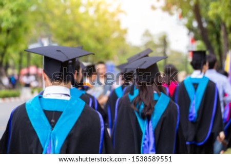 Blurred image back side view a group higher education graduation of graduates during commencement. Congratulation in University concept, Education concept.